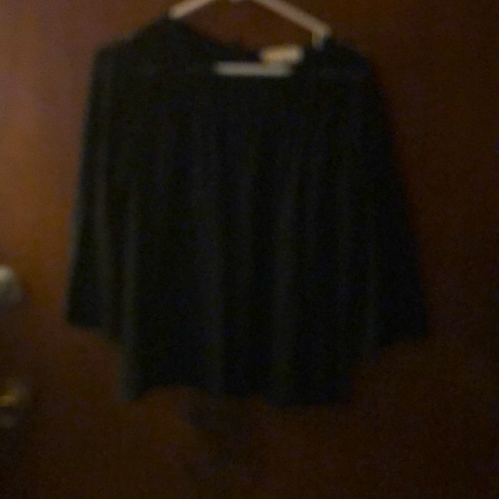 Michael Kora black top is slight see thru